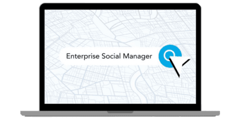 Laptop screen displaying "Enterprise Social Manager" on a map background.