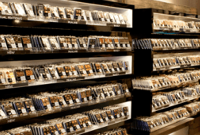 Shelves filled with rows of chocolate bars in various packaging.