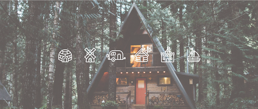 A-frame cabin in a forest with superimposed white icons of an igloo, windmill, camper, cabin, castle, and sailboat.