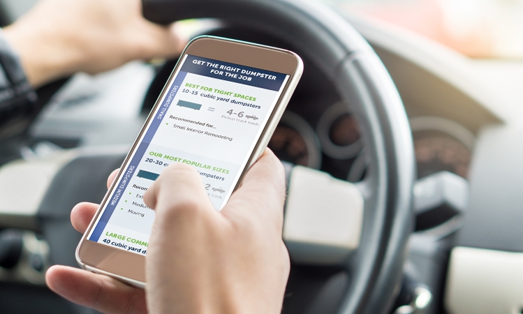Smartphone displaying a selection of dumpsters on the Casella website